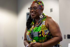 Terri Bailey smiling, about to speak