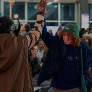 two people giving a high five